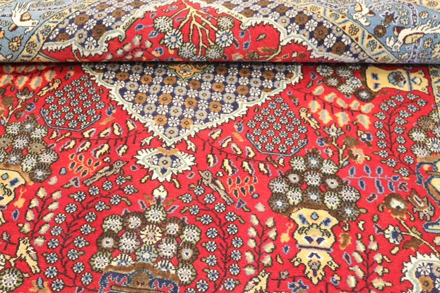 Perserteppich Ghom 207 x 143 cm Wolle handgeknüpft rot-orange